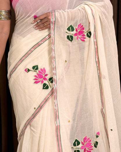 Soft and comfortable embroidered mulmul cotton saree in white for day festivities or casual outing
