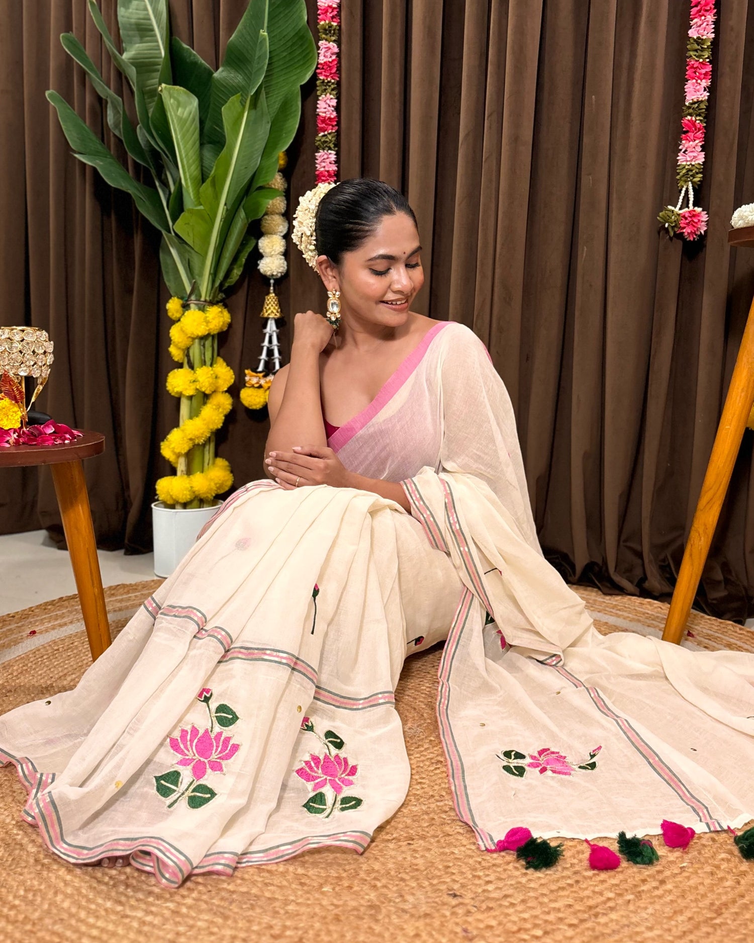 White mulmul cotton saree with hand embroidered lotus design