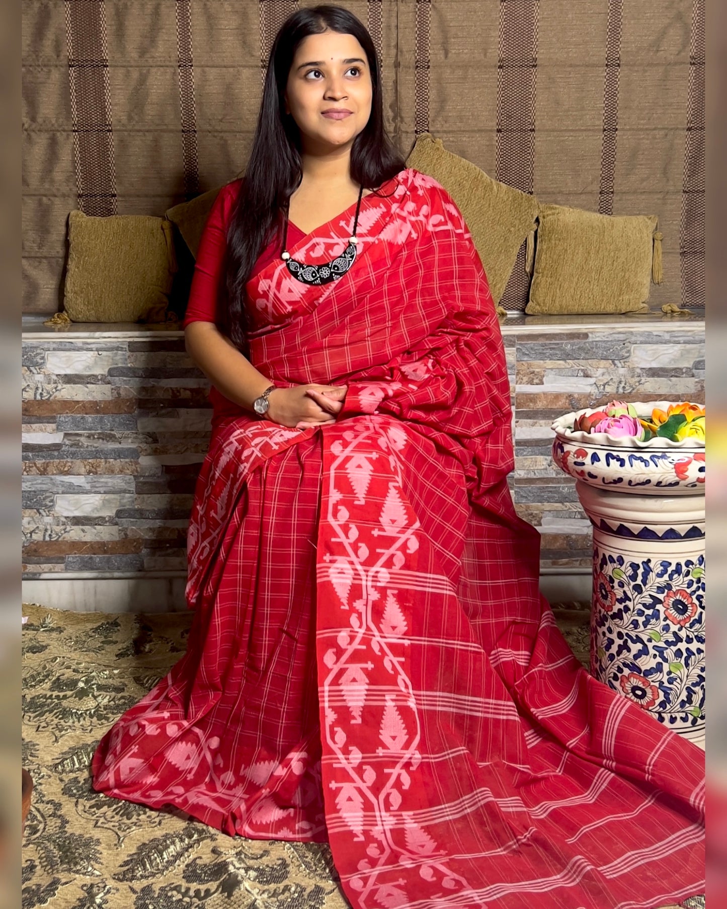 Red Khaadi sari with Jamdani white border and checks body for auspicious festivities and pujo- laal sada