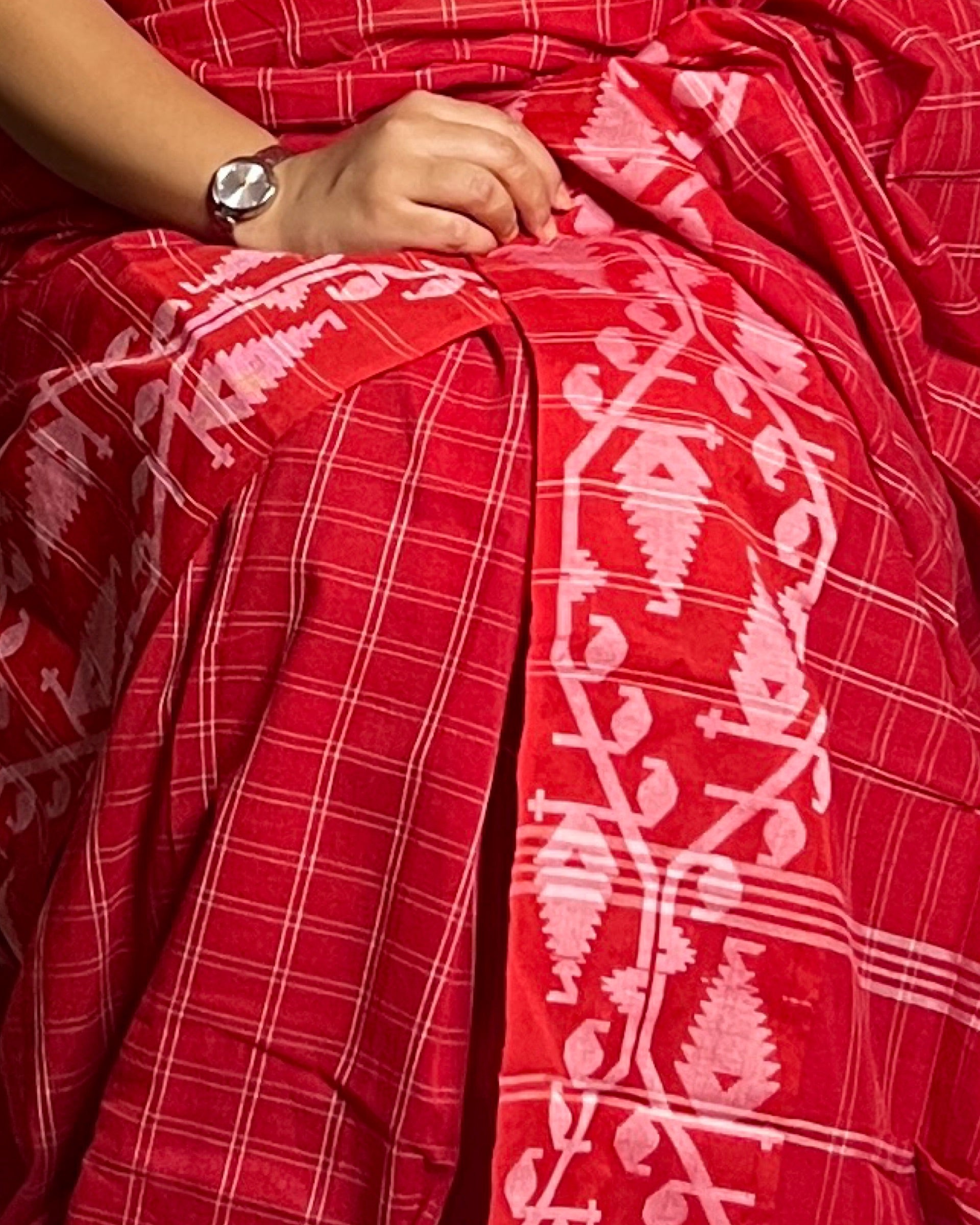 Red Khaadi sari with Jamdani white border and checks body for auspicious festivities and pujo- laal sada