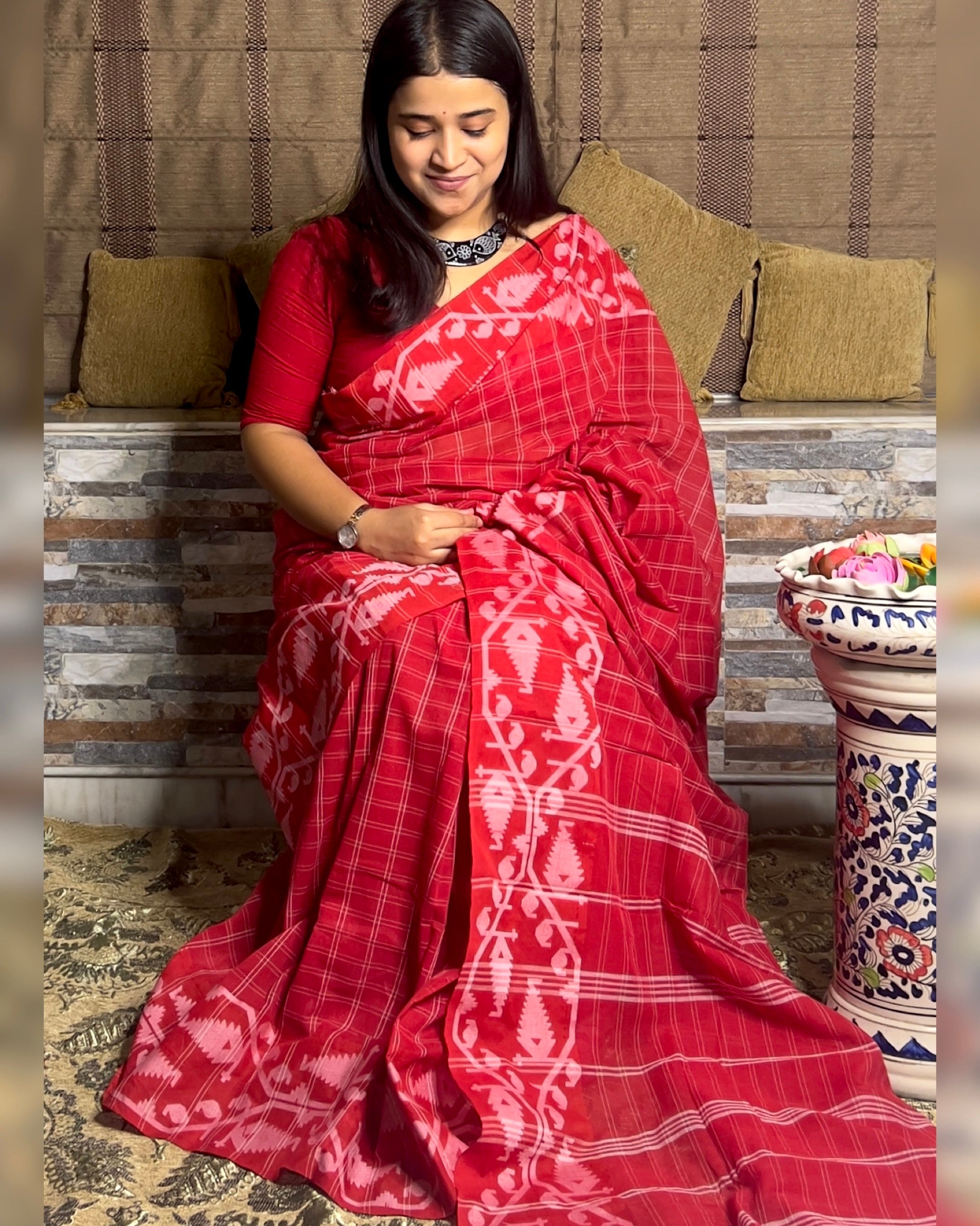 Red Khaadi sari with Jamdani white border and checks body for auspicious festivities and pujo- laal sada