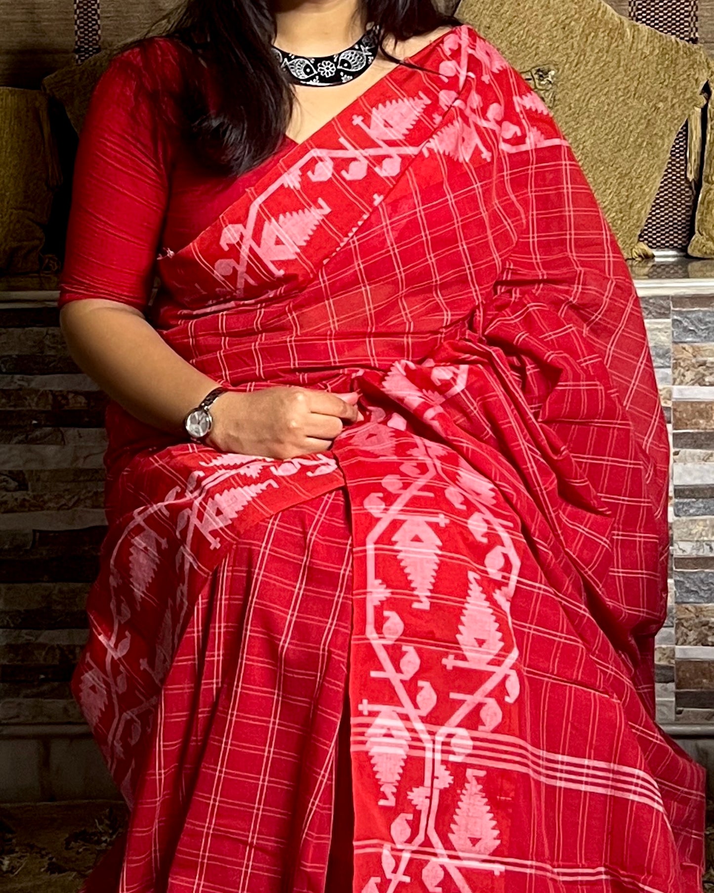 Red Khaadi sari with Jamdani white border and checks body for auspicious festivities and pujo- laal sada