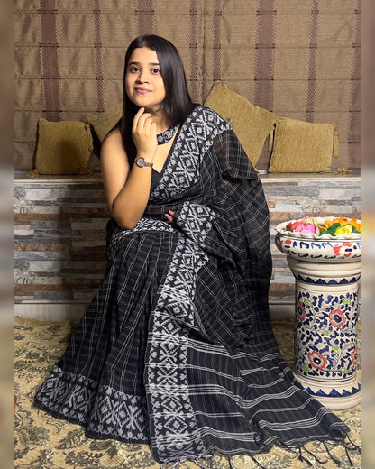 Black Khaadi sari with Jamdani white border and checks body for auspicious festivities and pujo- kalo sada