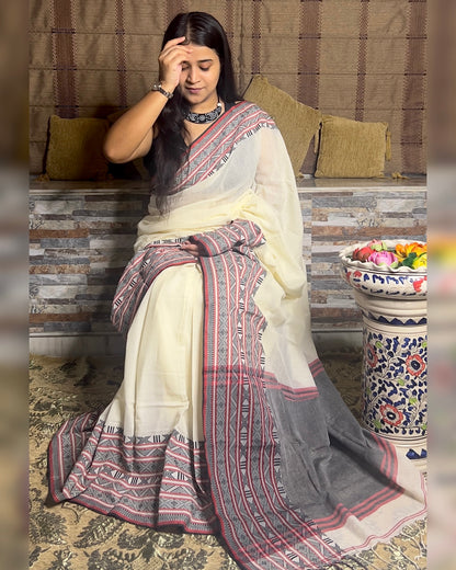 White Khaadi sari with black and red border for auspicious festivities and pujo- kalo laal sada