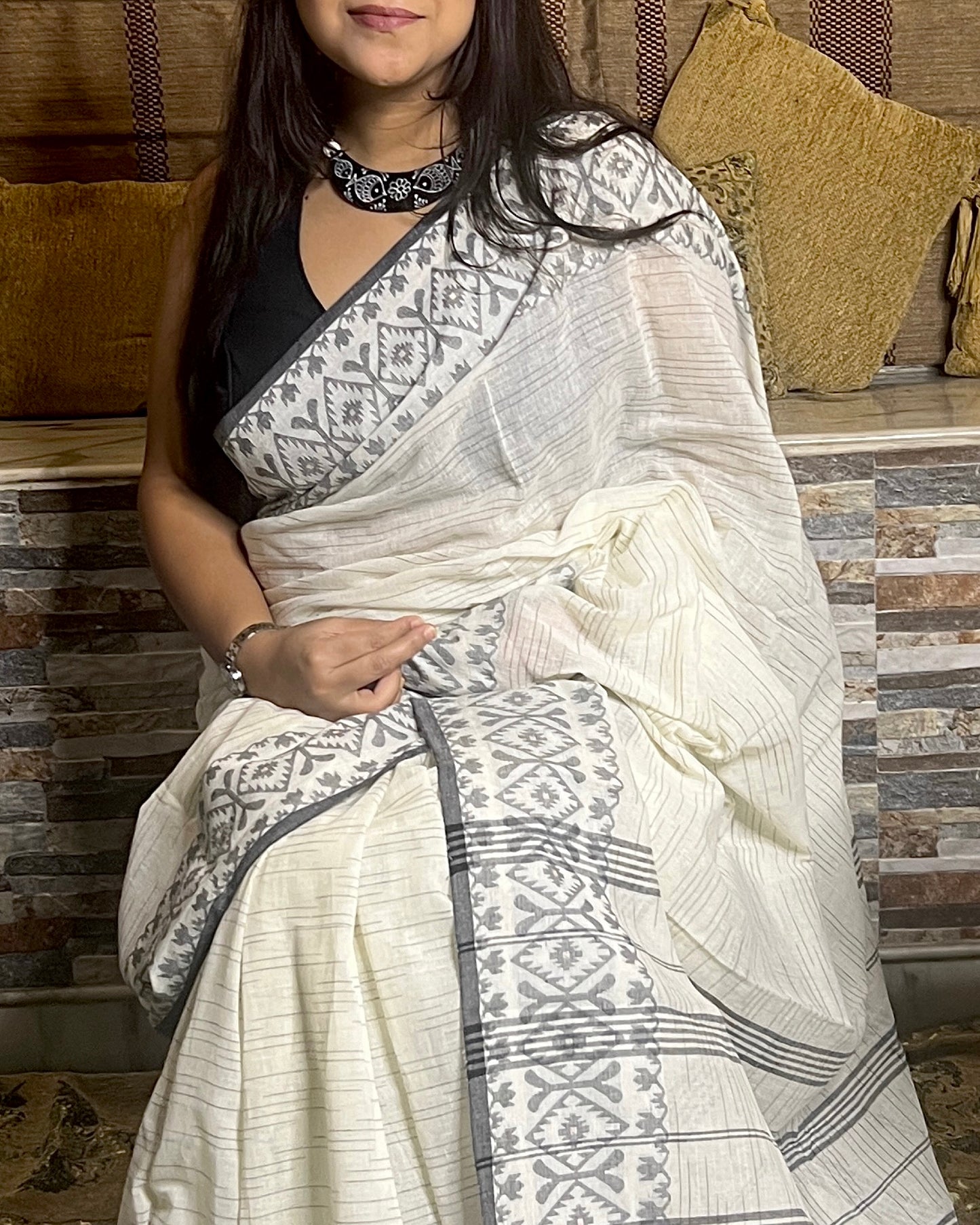 White Khaadi sari with Jamdani white border and checks body for auspicious festivities and pujo- kalo  sada