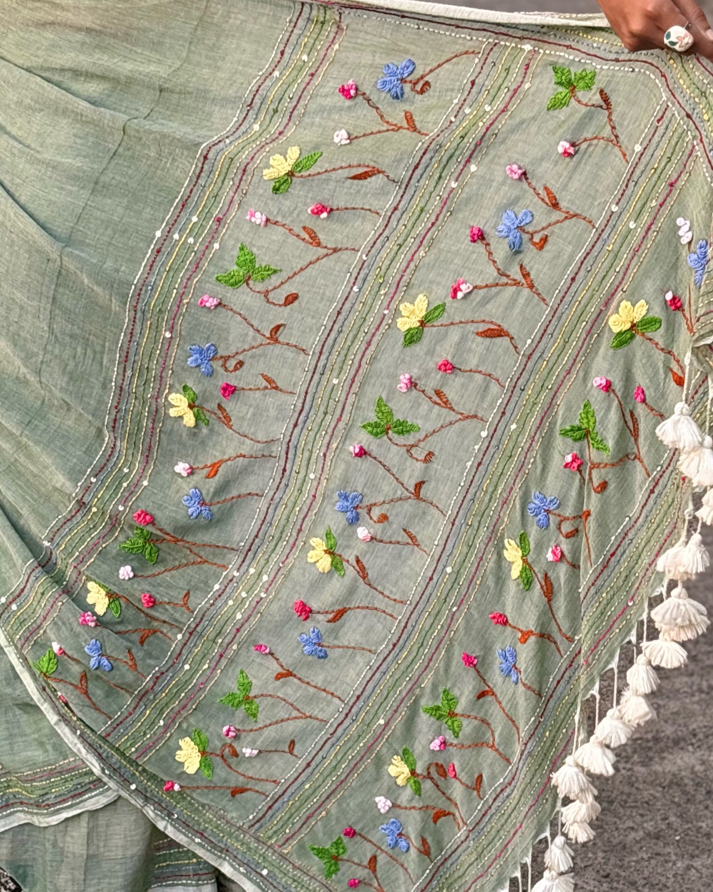 Green embroidered mulmul cotton saree