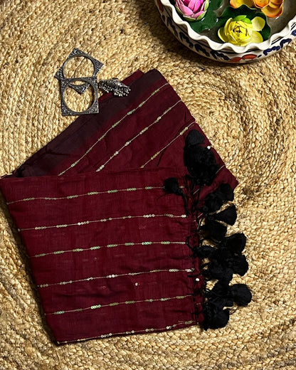 Soft and Comfortable mulmul cotton saree in maroon shade with sequin emblishment for festive or party wear at reasonable price