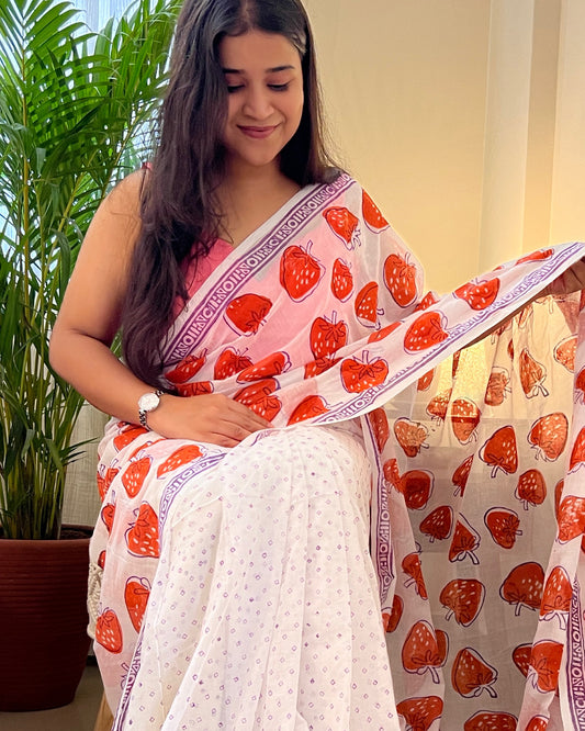 Soft & Comfortable white mulmul saree with handblock print in orange puple strawberry pattern