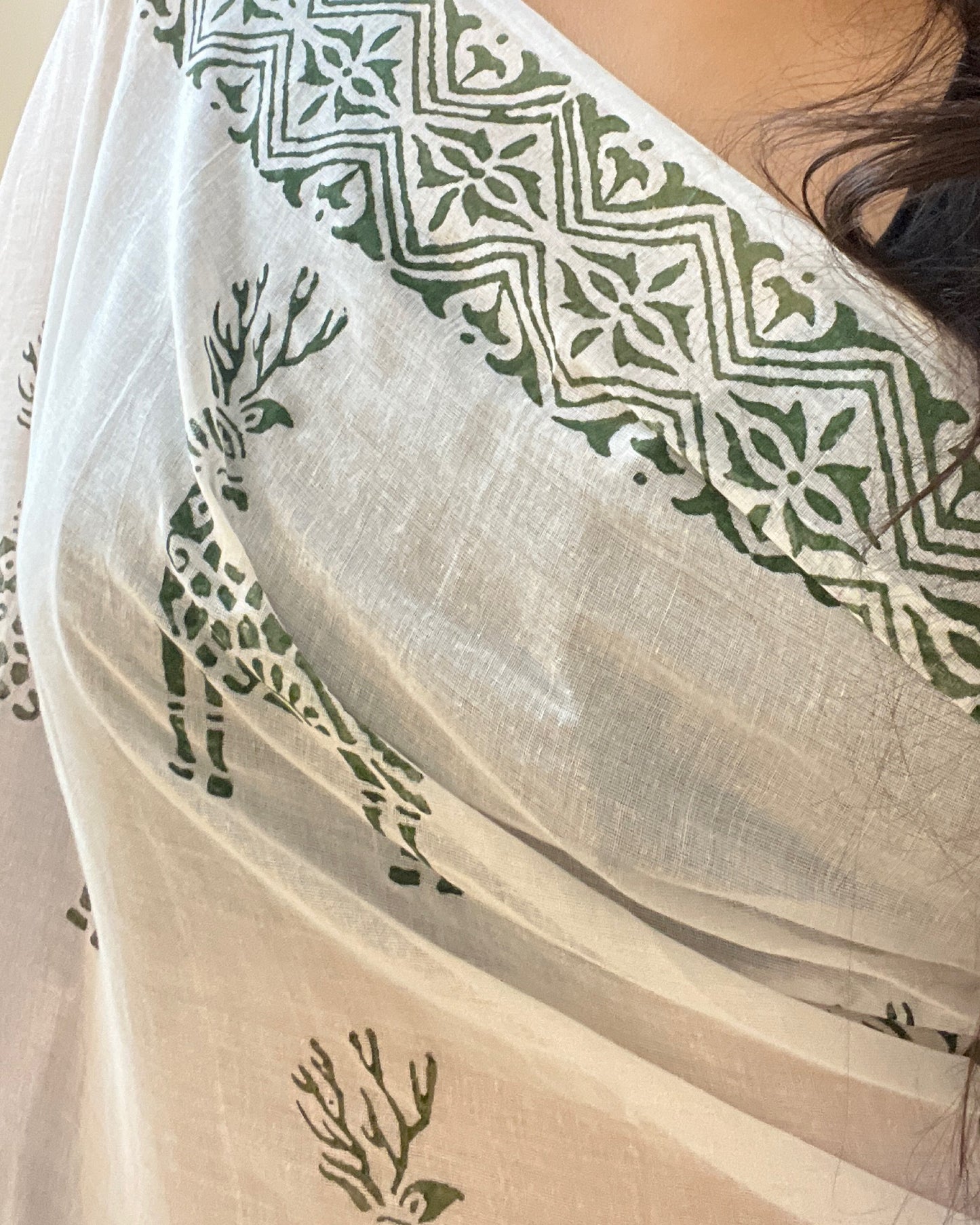 Soft & Comfortable white mulmul saree with handblock print in green deer pattern