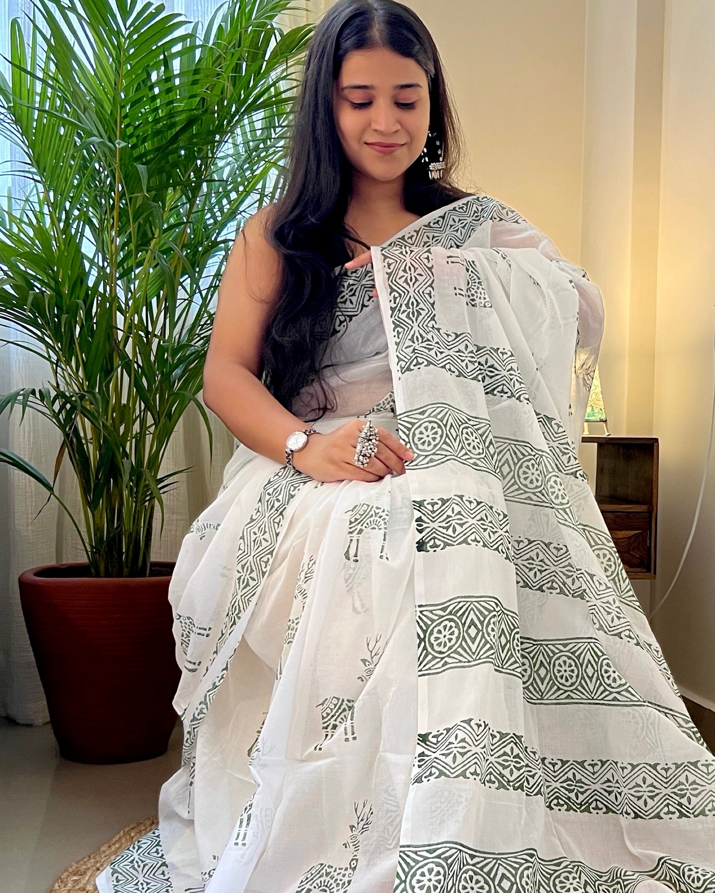 Soft & Comfortable white mulmul saree with handblock print in green deer pattern