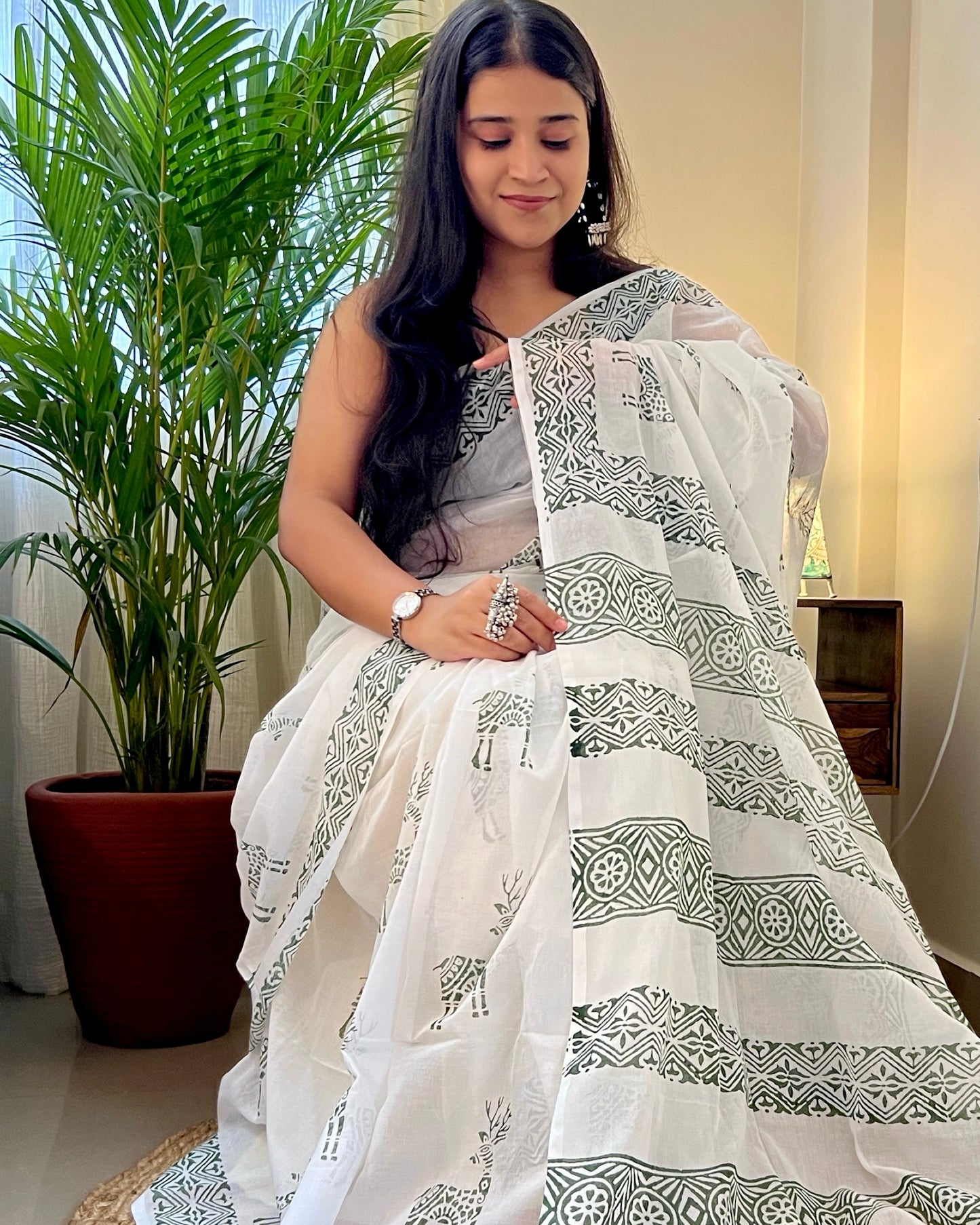 Soft & Comfortable white mulmul saree with handblock print in green deer pattern