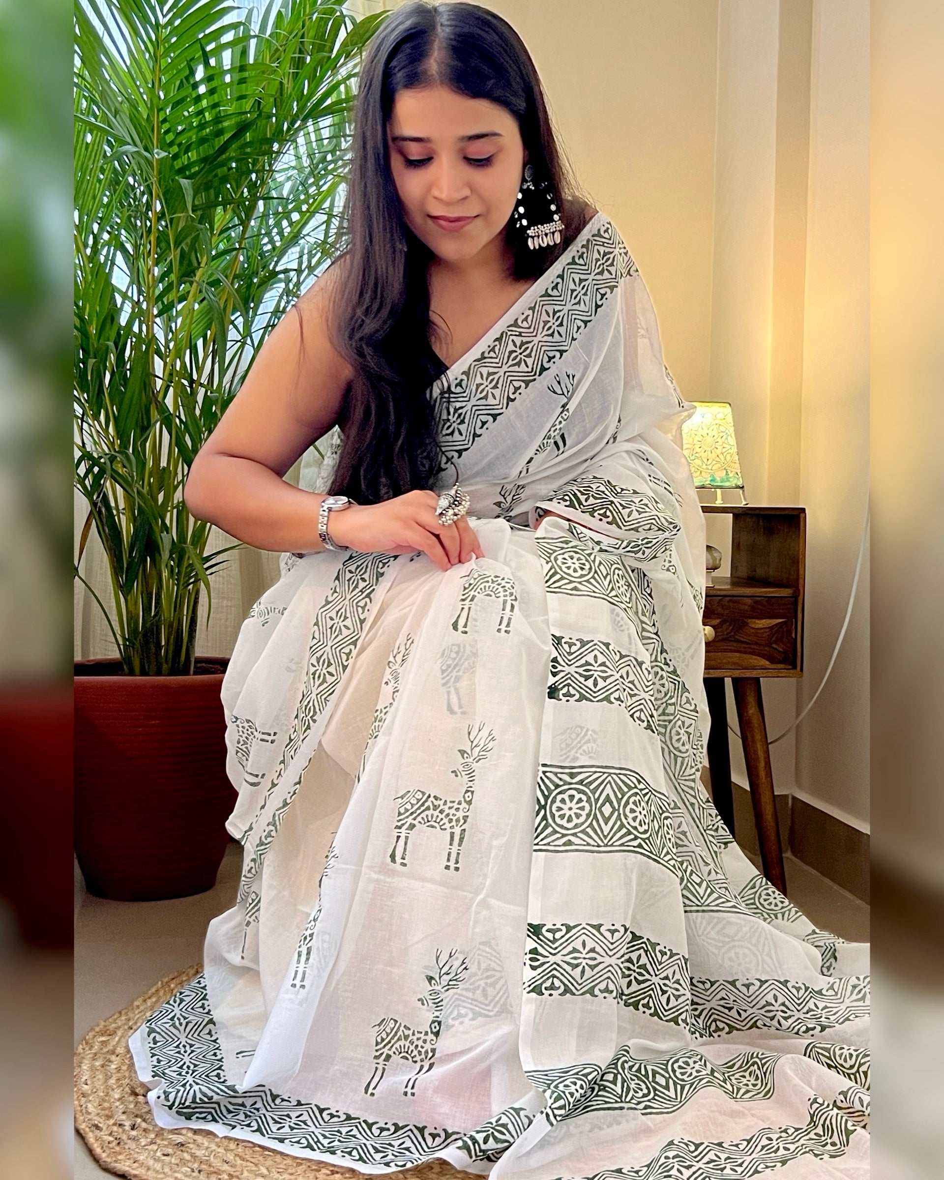 Soft & Comfortable white mulmul saree with handblock print in green deer pattern