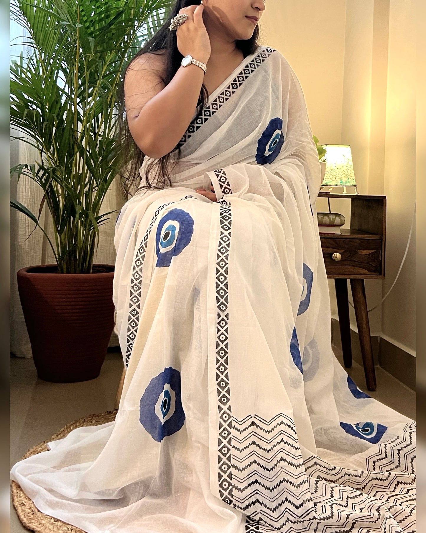 Soft & Comfortable white mulmul saree with handblock print in blue evil eye  pattern