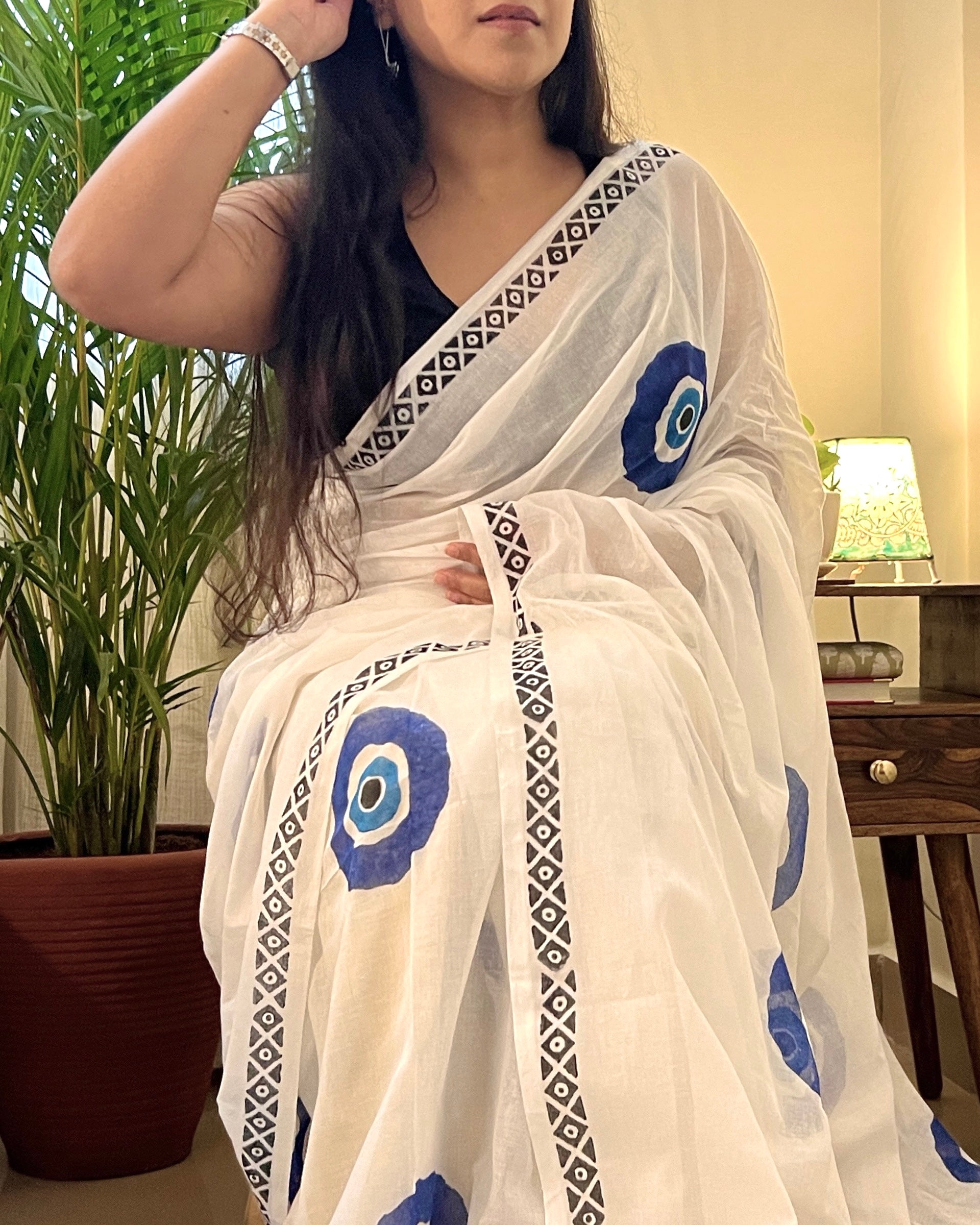 Soft & Comfortable white mulmul saree with handblock print in blue evil eye  pattern