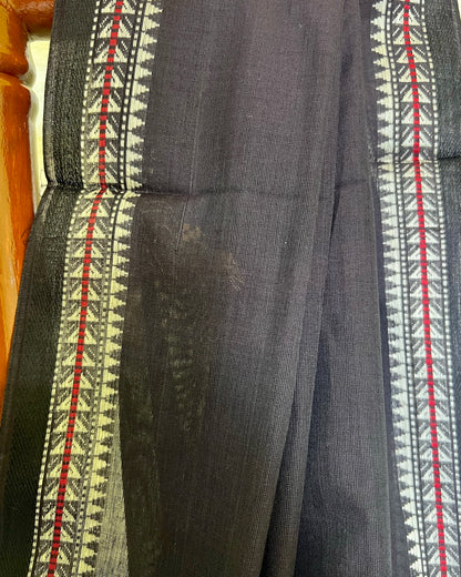 Dark gray khadi cotton fabric with red and white patterned border
