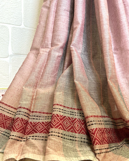 Pink khadi cotton saree with red and black patterns on a white background