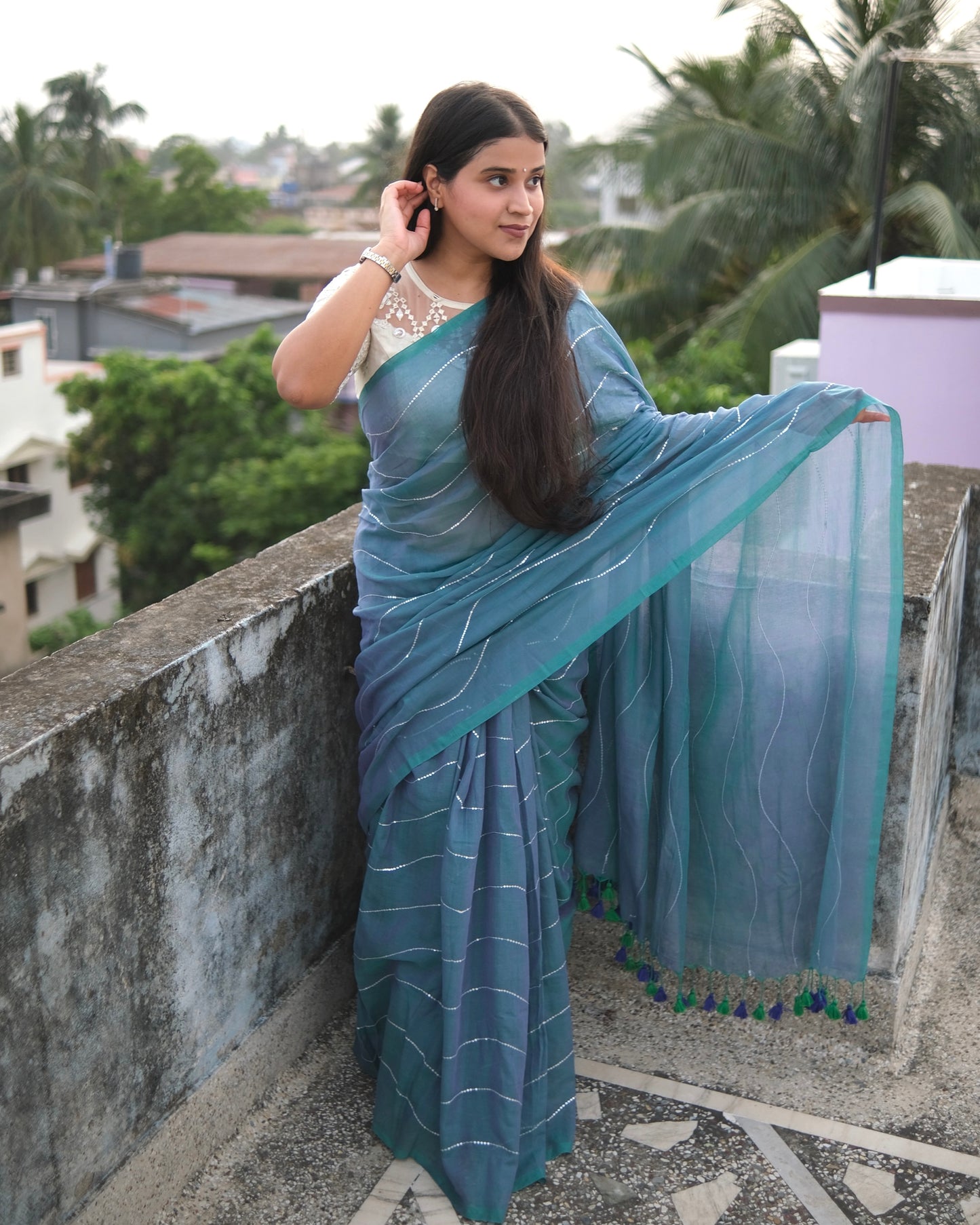 Soft and Comfortable mulmul cotton saree in dual tone purple violet and blue shade with sequin emblishment for festive or party wear at reasonable price