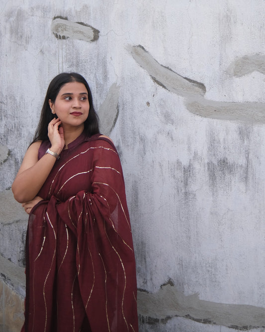 Soft and Comfortable mulmul cotton saree in maroon red shade with sequin emblishment for festive or party wear at reasonable price