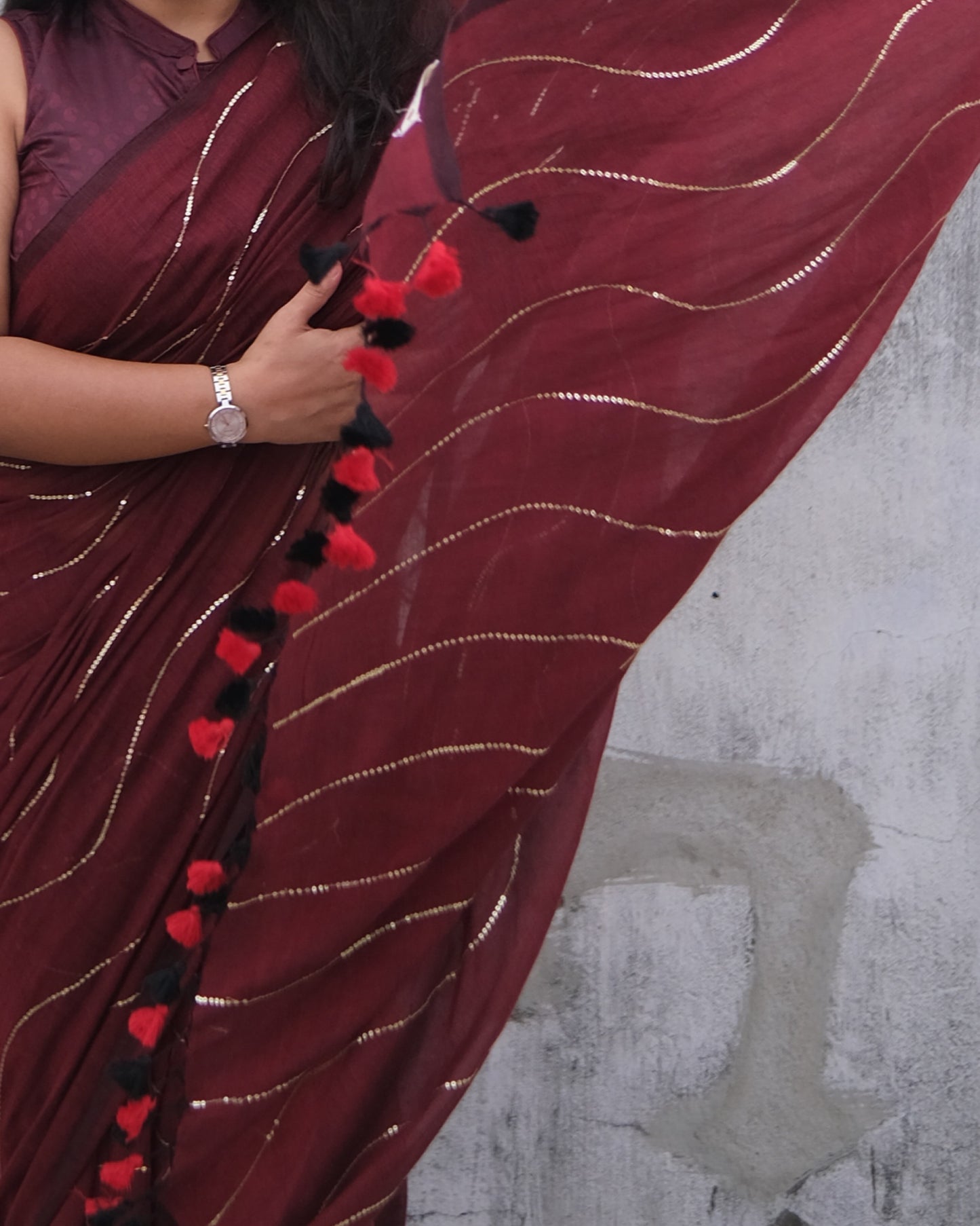 Soft and Comfortable mulmul cotton saree in maroon red shade with sequin emblishment for festive or party wear at reasonable price