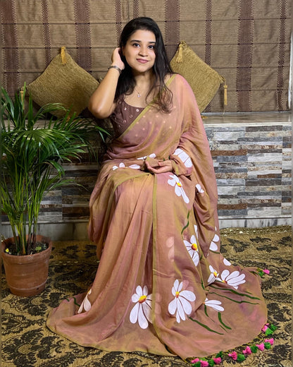 Soft and comfortable light weight dual tone beige and pink mulmul cotton saree with floral hand painting good for day time wear