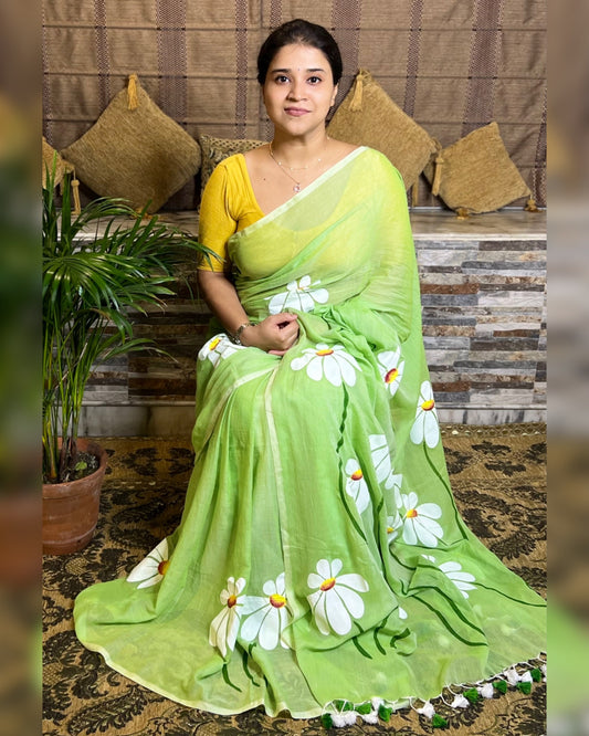 Soft and comfortable light weight light green mulmul cotton saree with floral hand painting good for day time wear