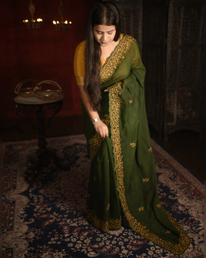 Soft and comfortable live green zari embroidered mulmul cotton saree