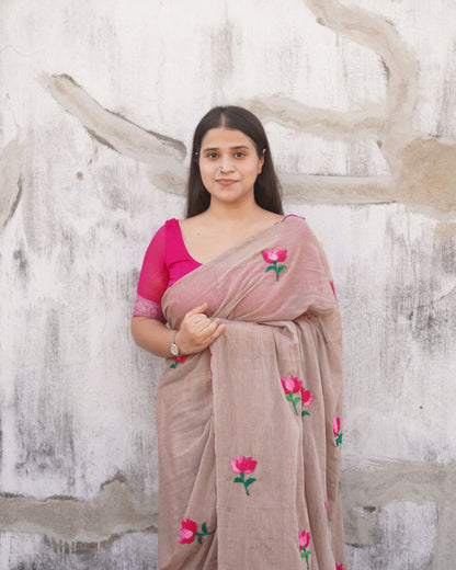 Soft and comfortable light weight beige brown taupe  mulmul cotton saree with lotus hand embroidery good for day time wear