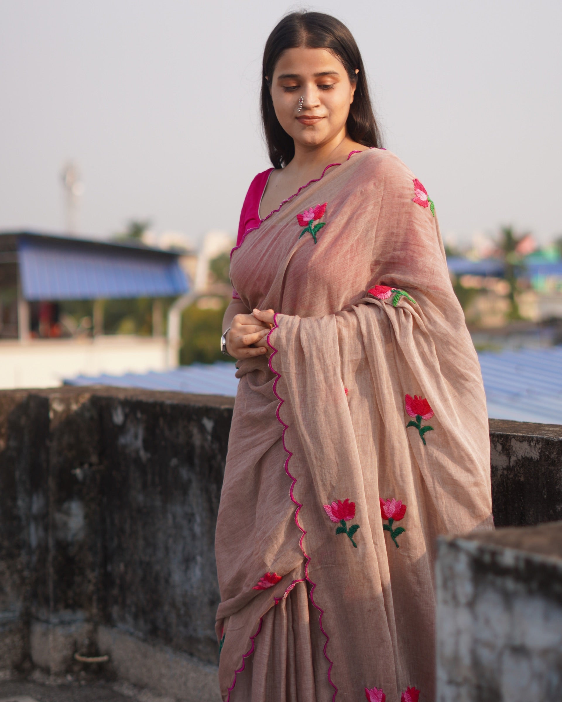 Soft and comfortable light weight beige brown taupe  mulmul cotton saree with lotus hand embroidery good for day time wear