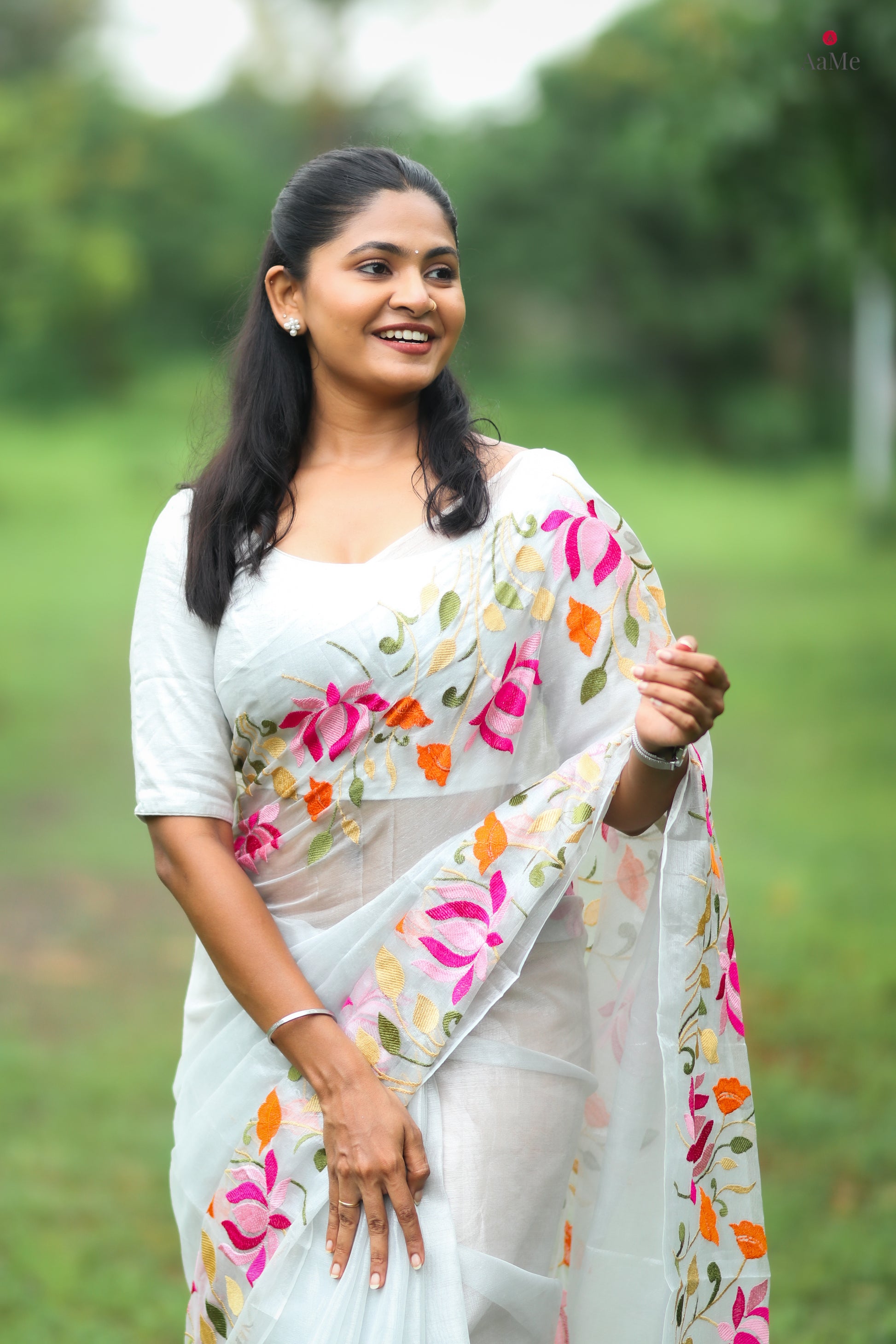 Silver white viral  tissue saree with floral embroidery orange and pink