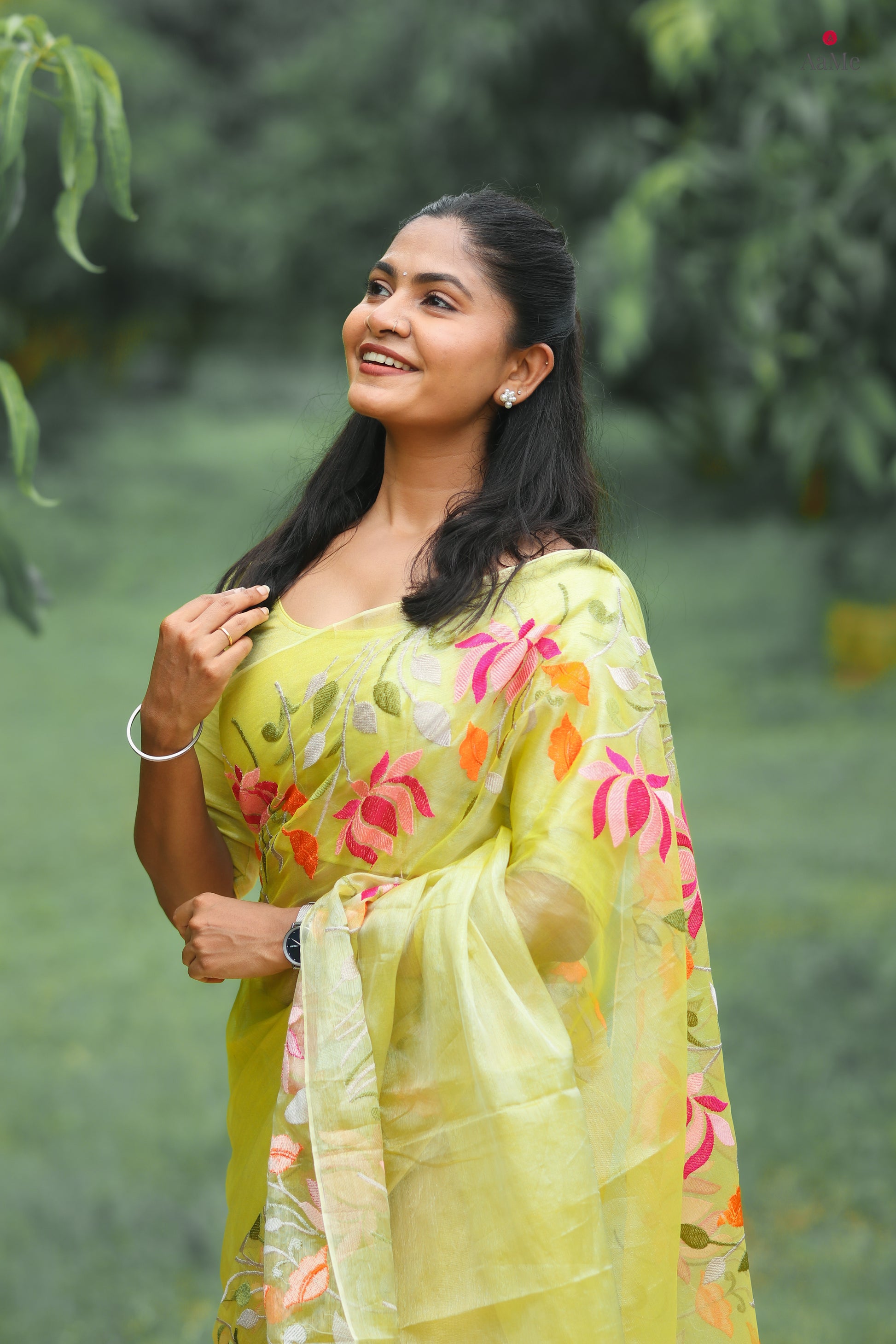 Yellow viral  tissue saree with floral embroidery orange and pink
