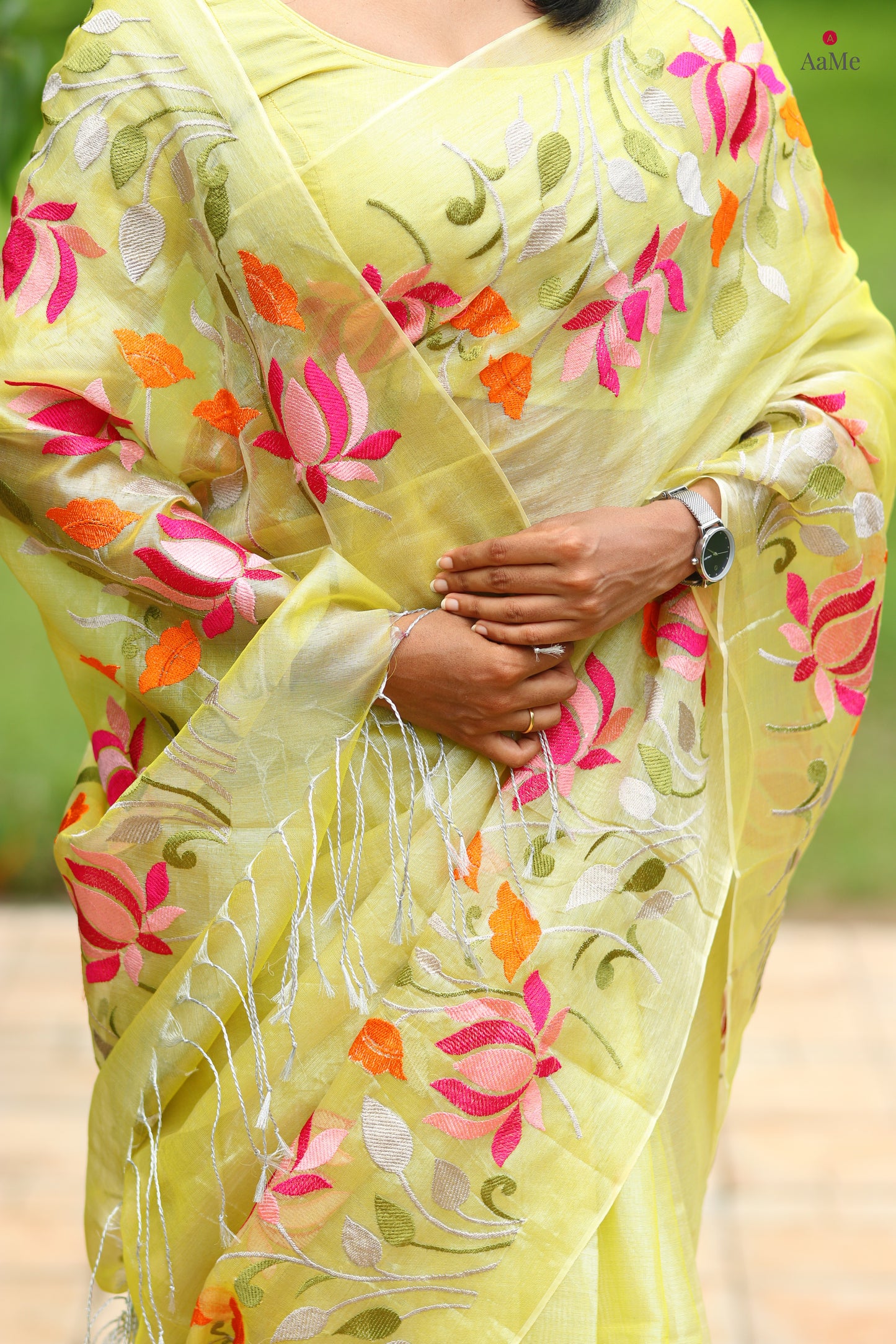 Yellow viral  tissue saree with floral embroidery orange and pink