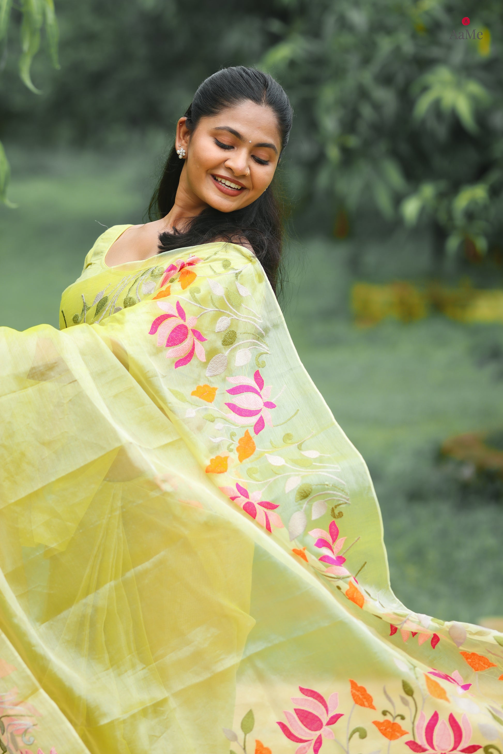 Yellow viral  tissue saree with floral embroidery orange and pink