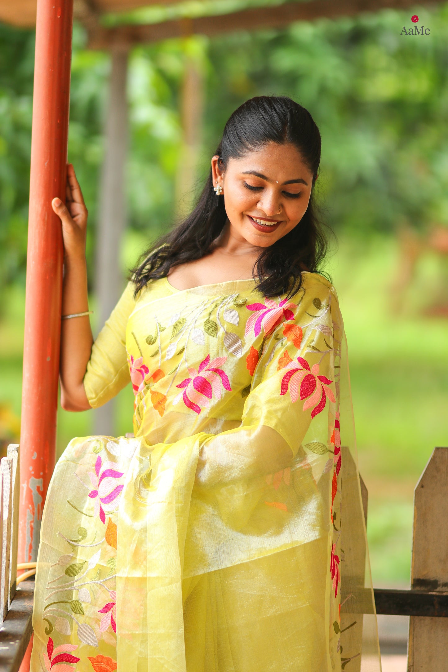 Yellow viral  tissue saree with floral embroidery orange and pink