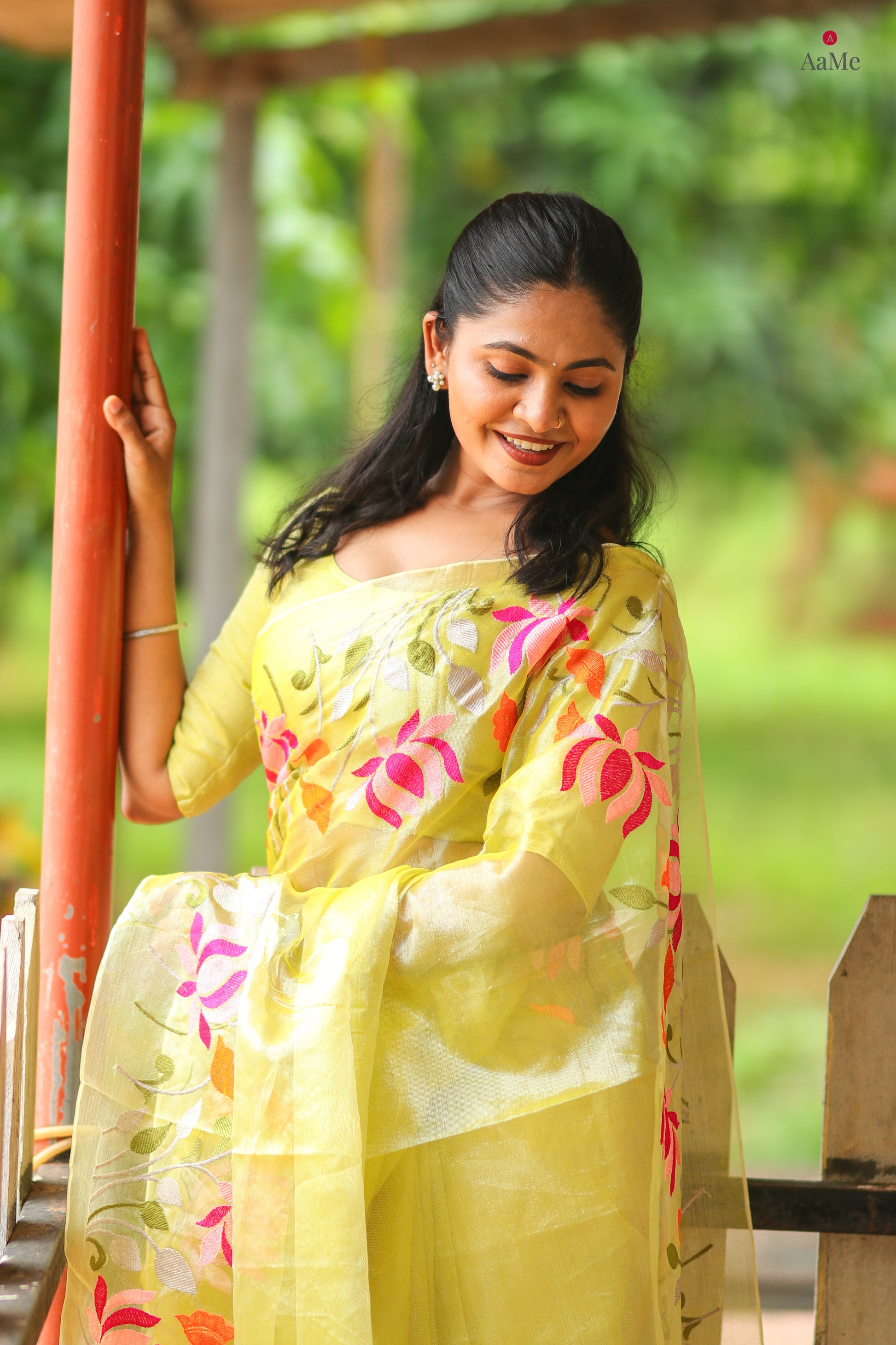 Yellow viral  tissue saree with floral embroidery orange and pink