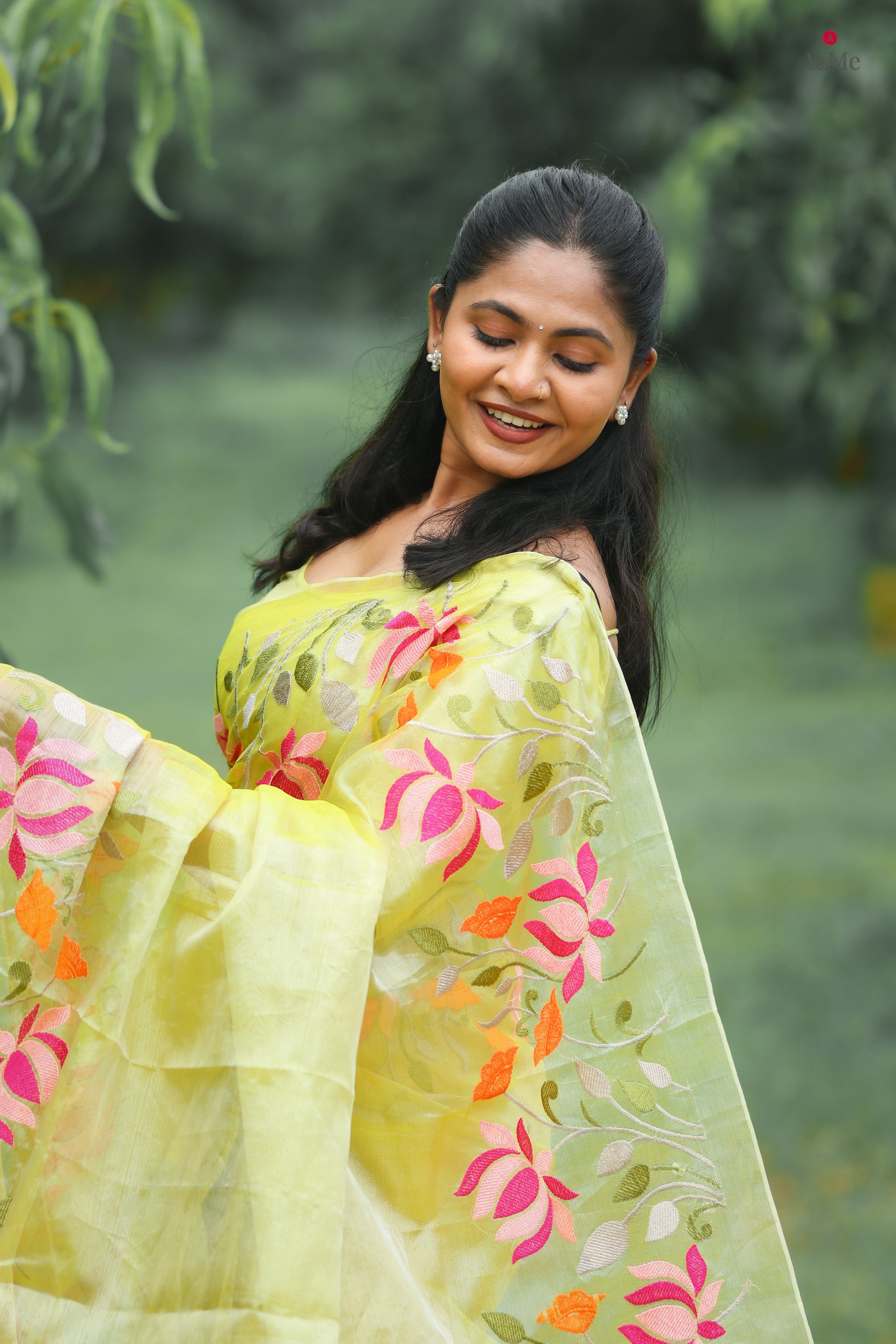 Yellow viral  tissue saree with floral embroidery orange and pink