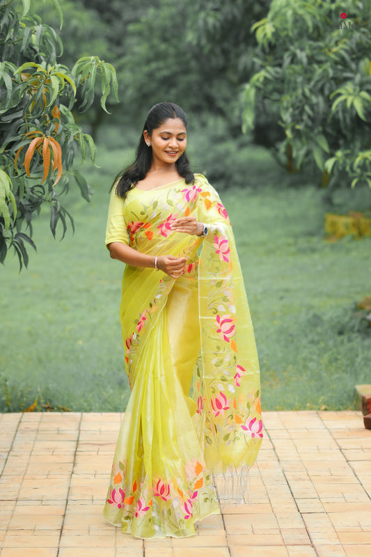 Yellow viral  tissue saree with floral embroidery orange and pink