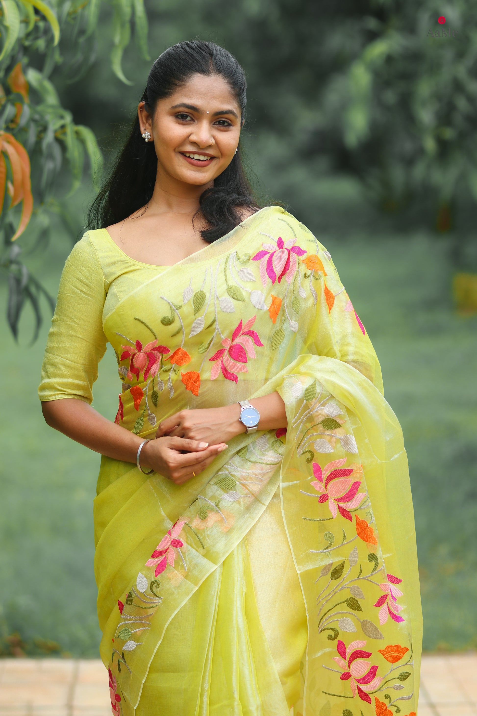 Yellow viral  tissue saree with floral embroidery orange and pink
